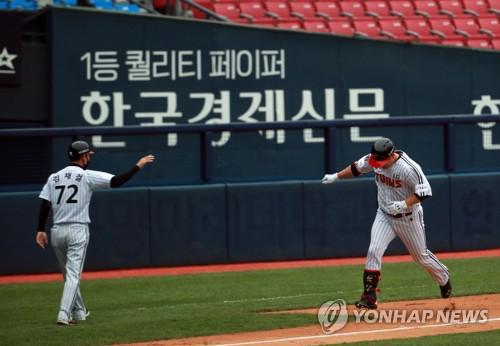 김현수, 2020시즌 KBO 1호 홈런…김태균은 1호 타점